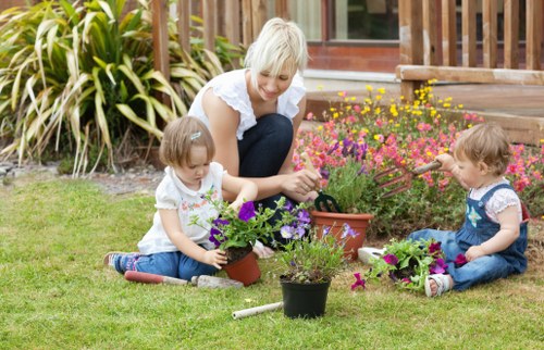 Experienced technician cleaning a deck with advanced tools in London