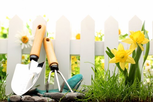 Homeowner cleaning deck in New Southgate with eco-friendly products